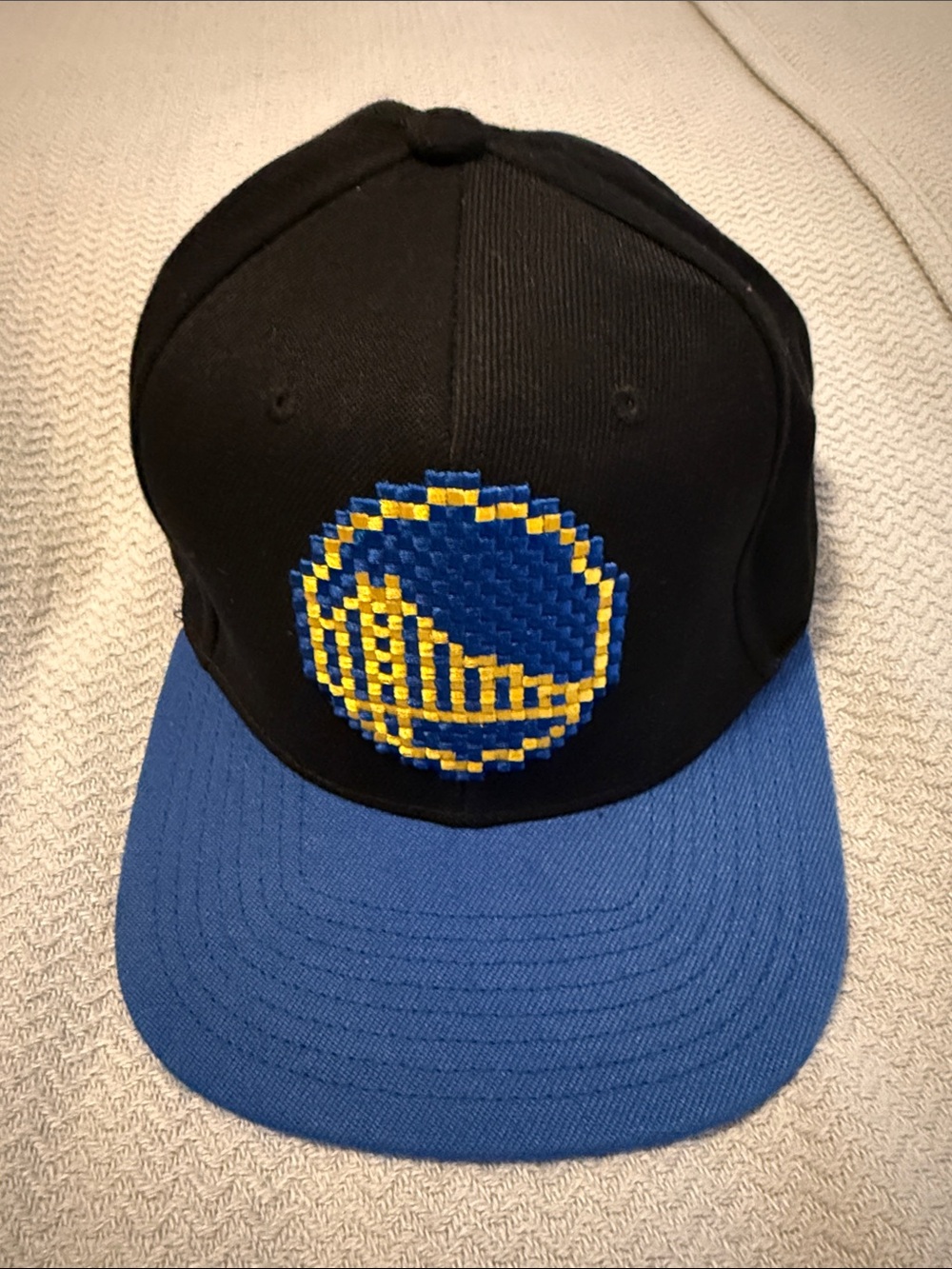 Mitchell & Ness Black Crown Royal Blue Brim Hat Golden State Warriors pixelated